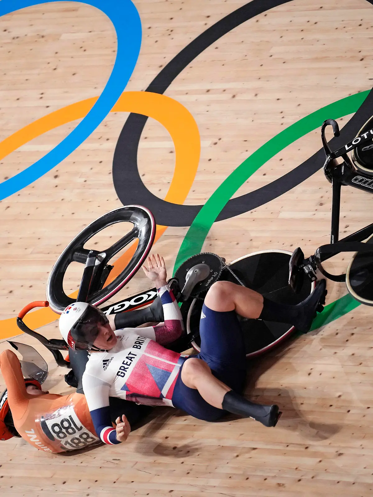 Katy Marchant of Team Great Britain crashes with Laurine van Riessen of Team Netherlands (188) during the track cycling women keirin at the 2020 Summer Olympics, Thursday, Aug. 5, 2021, in Izu, Japan. (AP Photo/Christophe Ena)