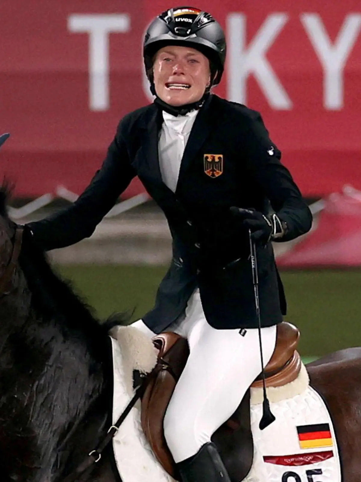 Tokyo 2020 Olympics - Modern Pentathlon - Women's Riding - Tokyo Stadium - Tokyo, Japan - August 6, 2021. Annika Schleu of Germany reacts before being eliminated REUTERS/Ivan Alvarado