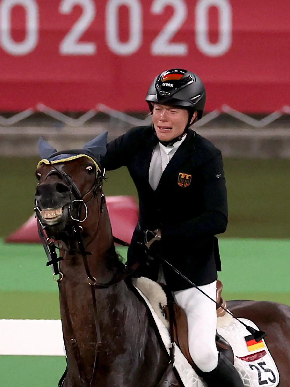 Tokyo 2020 Olympics - Modern Pentathlon - Women's Riding - Tokyo Stadium - Tokyo, Japan - August 6, 2021. Annika Schleu of Germany reacts before being eliminated REUTERS/Ivan Alvarado