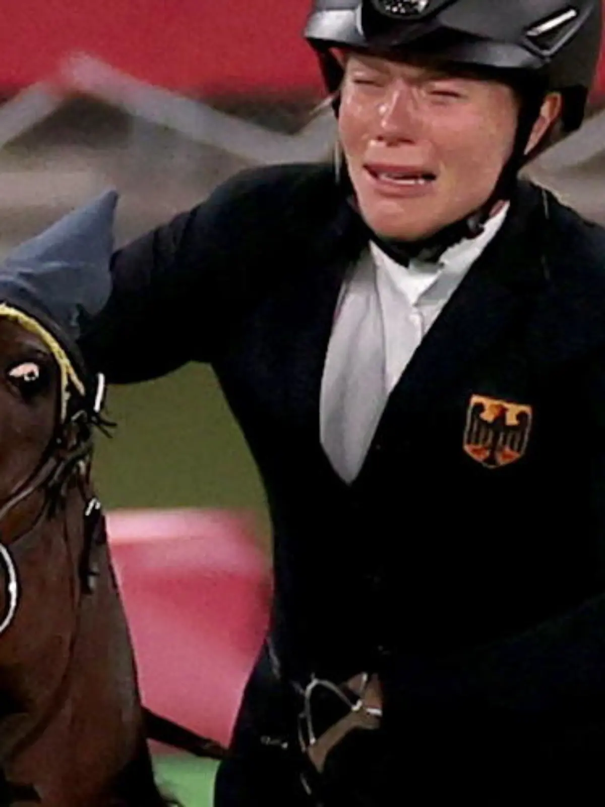 Tokyo 2020 Olympics - Modern Pentathlon - Women's Riding - Tokyo Stadium - Tokyo, Japan - August 6, 2021. Annika Schleu of Germany reacts before being eliminated REUTERS/Ivan Alvarado