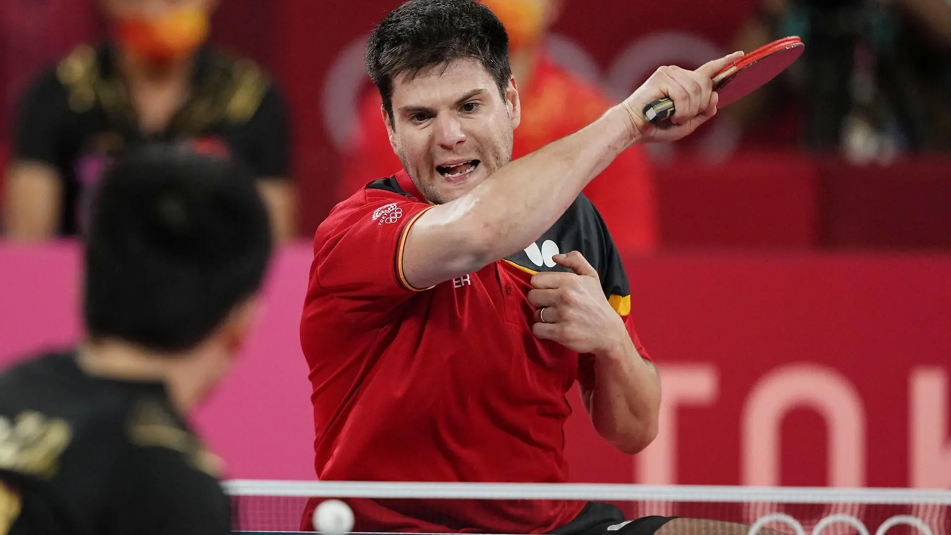Tokyo Olympics: Table tennis, Tischtennis Germany s Dimitrij Ovtcharov facing camera plays against China s Fan Zhendong in the second match of the men s table tennis team event s gold medal contest at the Tokyo Olympics on Aug. 6, 2021, at Tokyo Metropolitan Gymnasium. PUBLICATIONxINxGERxSUIxAUTxHUNxONLY A14AA0000756892P