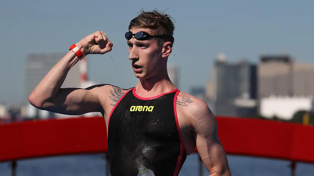 TOKYO, JAPAN - AUGUST 05: Florian Wellbrock of Team Germany reacts after winning Gold in the Men's 10km Marathon Swimming on day thirteen of the Tokyo 2020 Olympic Games at Odaiba Marine Park on August 05, 2021 in Tokyo, Japan. (Photo by Al Bello/Getty Images)