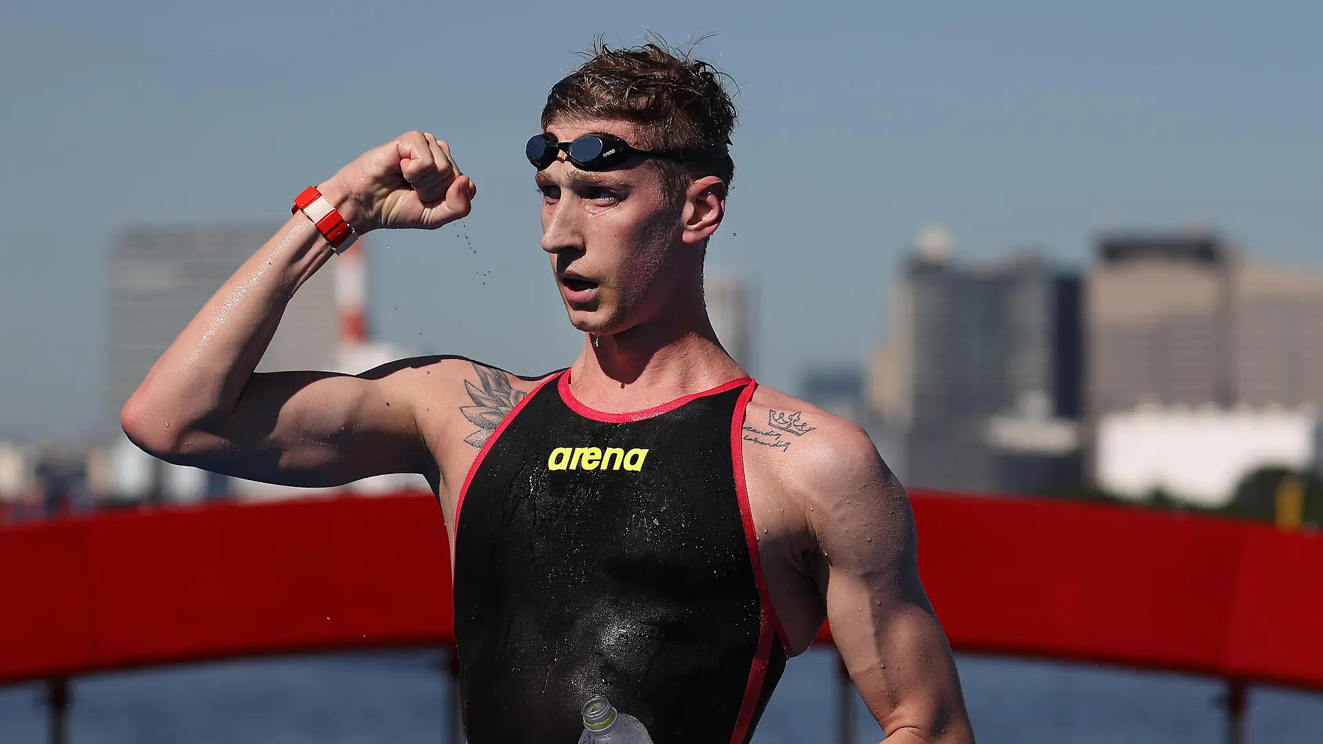 TOKYO, JAPAN - AUGUST 05: Florian Wellbrock of Team Germany reacts after winning Gold in the Men's 10km Marathon Swimming on day thirteen of the Tokyo 2020 Olympic Games at Odaiba Marine Park on August 05, 2021 in Tokyo, Japan. (Photo by Al Bello/Getty Images)