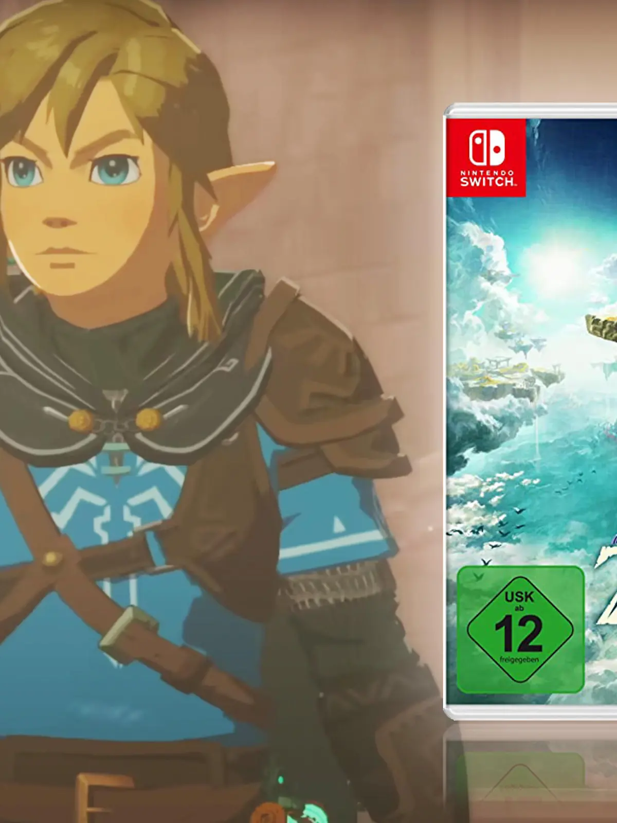 Link ist im Hintergrund zu erkennen, während neben ihm das neue Spiel "Tears of the Kingdom" leuchtend schwebt.