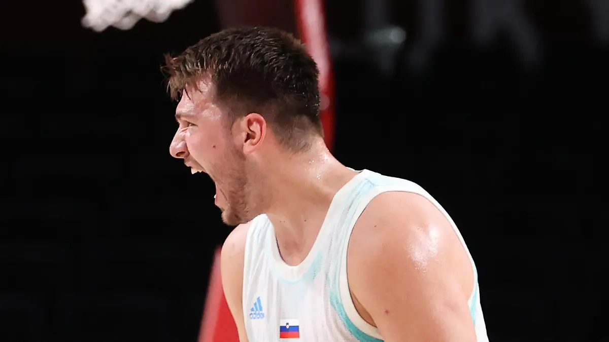 SAITAMA, JAPAN - AUGUST 03: Luka Doncic #77 of Team Slovenia reacts against Team Germany during the first half of a Men's Basketball Quarterfinal game on day eleven of the Tokyo 2020 Olympic Games at Saitama Super Arena on August 03, 2021 in Saitama, Japan. (Photo by Gregory Shamus/Getty Images)