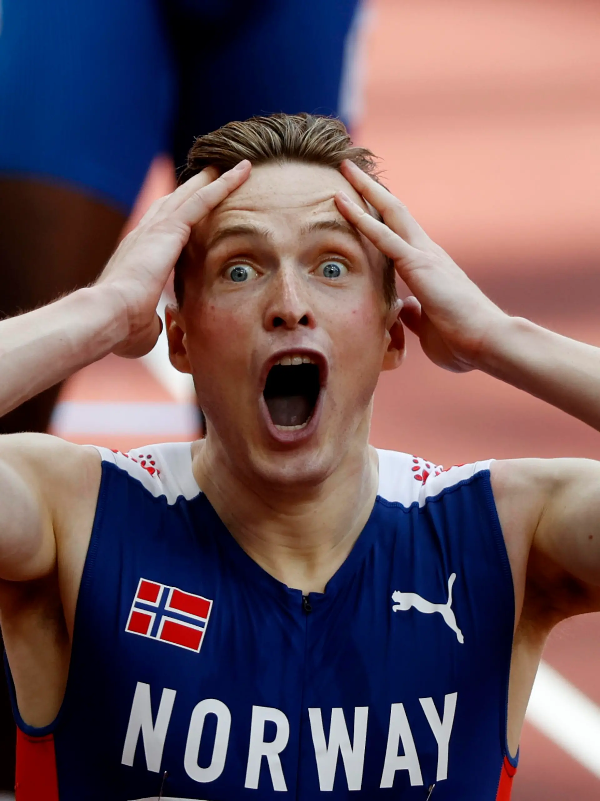 Tokyo 2020 Olympics - Athletics - Men's 400m Hurdles - Final - Olympic Stadium, Tokyo, Japan - August 3, 2021. Karsten Warholm of Norway celebrates after winning gold and setting a new world record REUTERS/Phil Noble