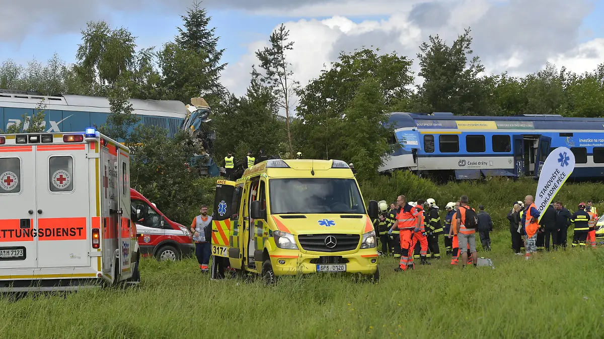 Two people died and seven are in the critical state after the collision of two trains near the village of Milavce between the stations Domazlice and Blizejov , Czech Republic, August 4, 2021. CTKxPhoto/MiroslavxChaloupka CTKPhotoP2021080405718 PUBLICATIONxNOTxINxCZExSVK CHA 01