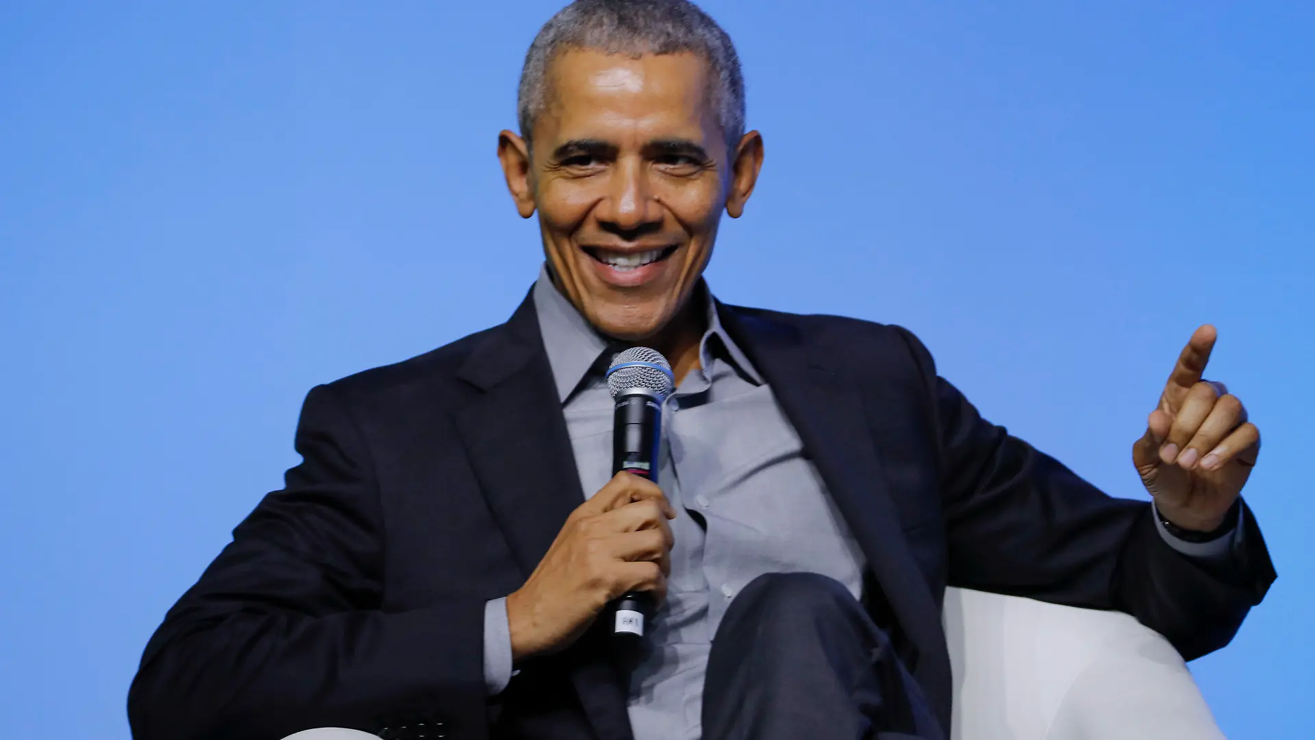 FILE - Former U.S. President Barack Obama gesture as he attends the "values-based leadership" during a plenary session of the Gathering of Rising Leaders in the Asia Pacific, organized by the Obama Foundation in Kuala Lumpur, Malaysia, on Dec. 13, 2019. Obama’s memoir “Dreams from My Father” will be released in a young adult edition on October 5. Obama had yet to hold any political office when “Dreams from My Father” was released in 1995.  (AP Photo/Vincent Thian, File)