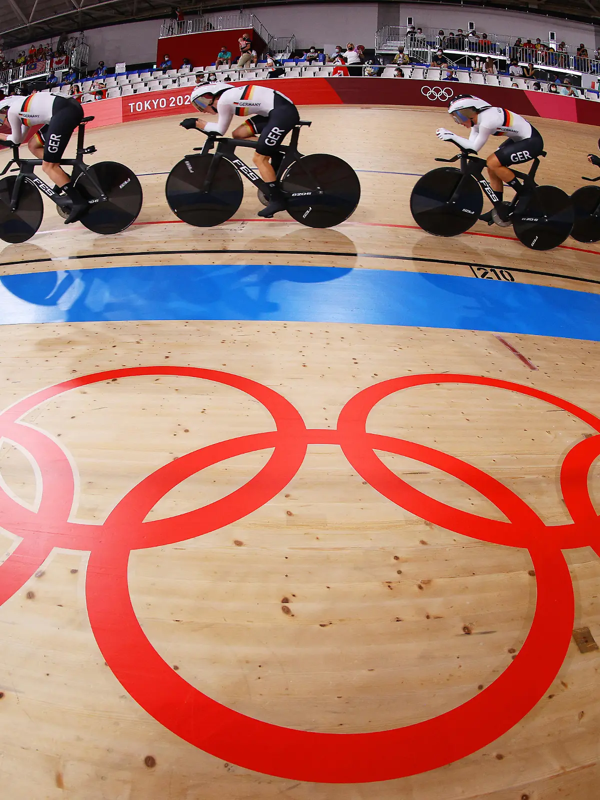 IZU, JAPAN - AUGUST 03: A general view of Franziska Brausse, Lisa Brennauer, Lisa Klein and Mieke Kroeger of Team Germany sprint to setting a new Olympic record during the Women's team pursuit first round, heat 4 of the Track Cycling on day eleven of the Tokyo 2020 Olympic Games at Izu Velodrome on August 03, 2021 in Izu, Japan. (Photo by Tim de Waele/Getty Images)