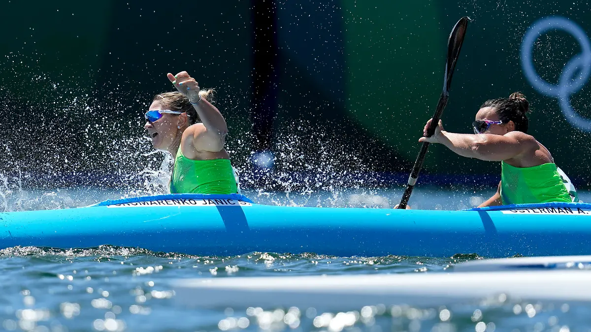 Spela Ponomarenko Janic and Anja Osterman of Slovenia tip their boat while competing in the women's kayak double 500m semifinal at the 2020 Summer Olympics, Tuesday, Aug. 3, 2021, in Tokyo, Japan. (AP Photo/Lee Jin-man)