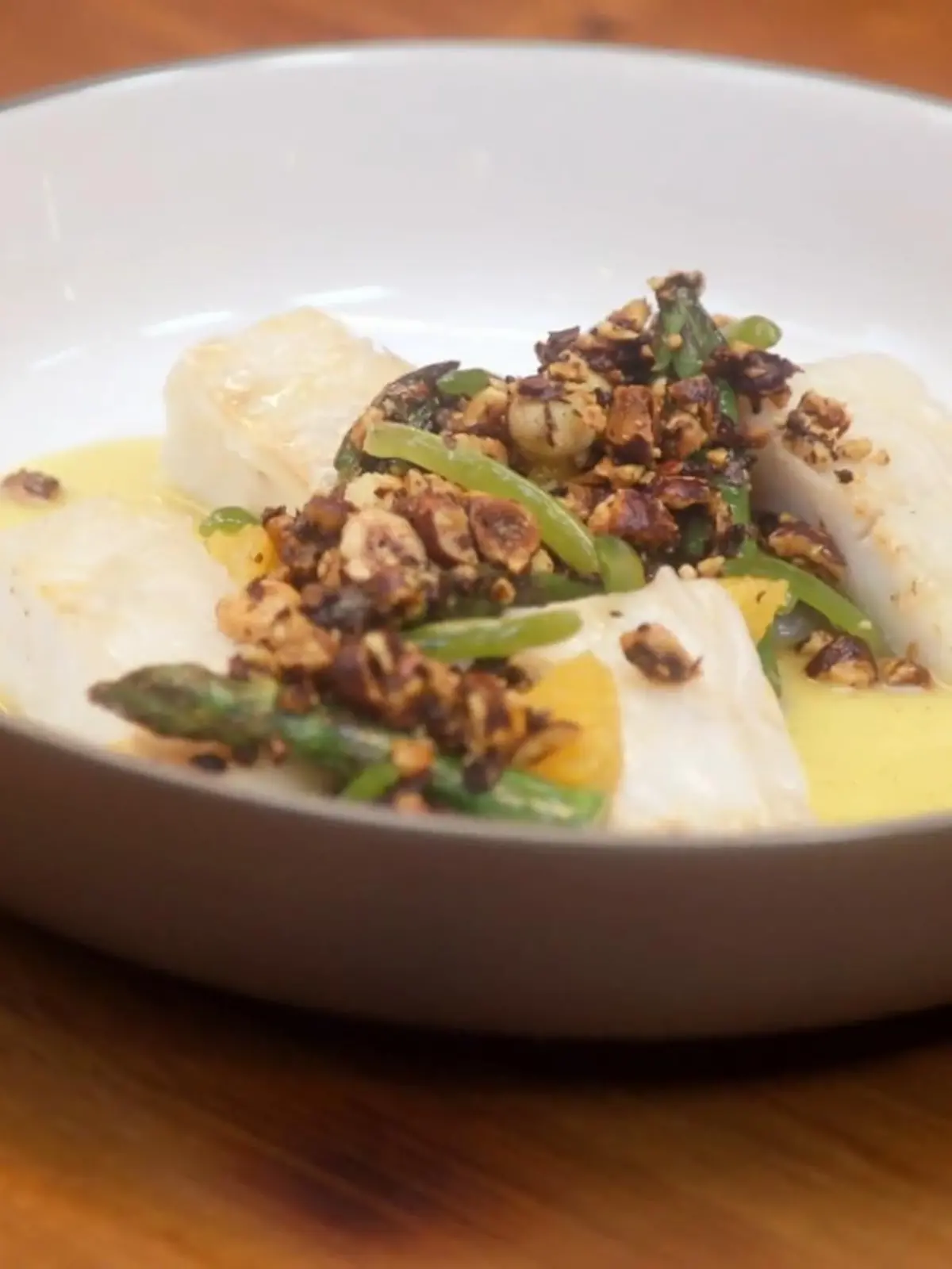 Bild zu: "Jonas' Gericht: Loup de Mer mit Lardo, einer Orangen-Vanille-Buttersauce"