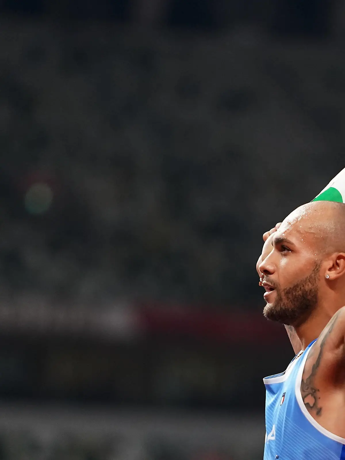210801 -- TOKYO, Aug. 1, 2021 -- Lamont Marcell Jacobs of Italy reacts after the Men s 100m Final at the Tokyo 2020 Olympic Games, Olympische Spiele, Olympia, OS in Tokyo, Japan, Aug. 1, 2021.  TOKYO2020JAPAN-TOKYO-OLY-ATHLETICS-MEN S 100M-FINAL LuixSiuxWai PUBLICATIONxNOTxINxCHN 