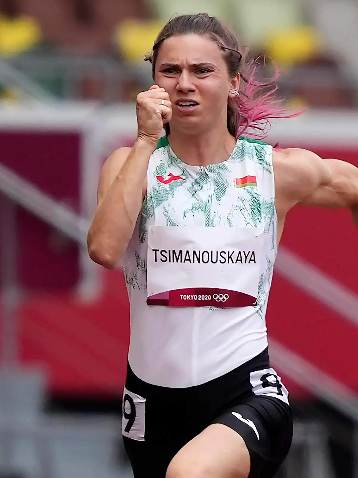 dpatopbilder - 30.07.2021, Japan, Tokio: Leichtathletik: Olympia, 100m, Frauen. Krystsina Tsimanouskaya aus Belarus in Aktion. Tsimanouskaya teilte mit, dass ihr Olympiateam versucht hatte sie gegen ihren Willen von den Olympischen Spielen zu entfernen und sie zurück nach Belarus fliegen zu lassen, nachdem sie sich kritisch zu den Trainern äußerte. Eine Aktivistengruppe, die Tsimanouskaya unterstützt, teilte mit, dass sie ihr Leben in Belarus in Gefahr sehen und dass sie bei der österreichischen Botschaft in Tokio um Asyl bitte. Foto: Martin Meissner/AP/dpa +++ dpa-Bildfunk +++
