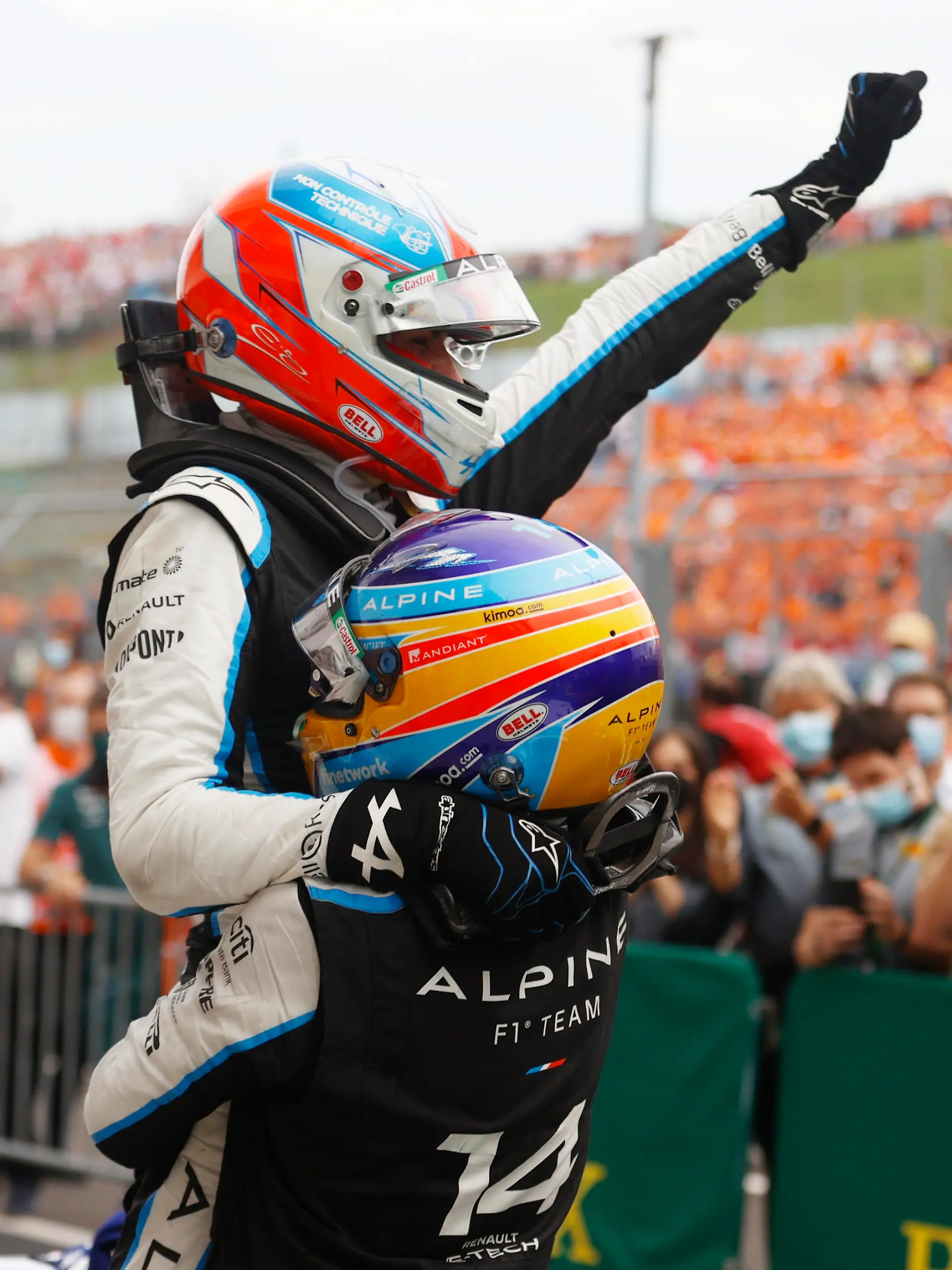Formula One F1 - Hungarian Grand Prix - Hungaroring, Budapest, Hungary - August 1, 2021 Alpine's Esteban Ocon celebrates with teammate Fernando Alonso after winning the race Pool via REUTERS/Florion Goga