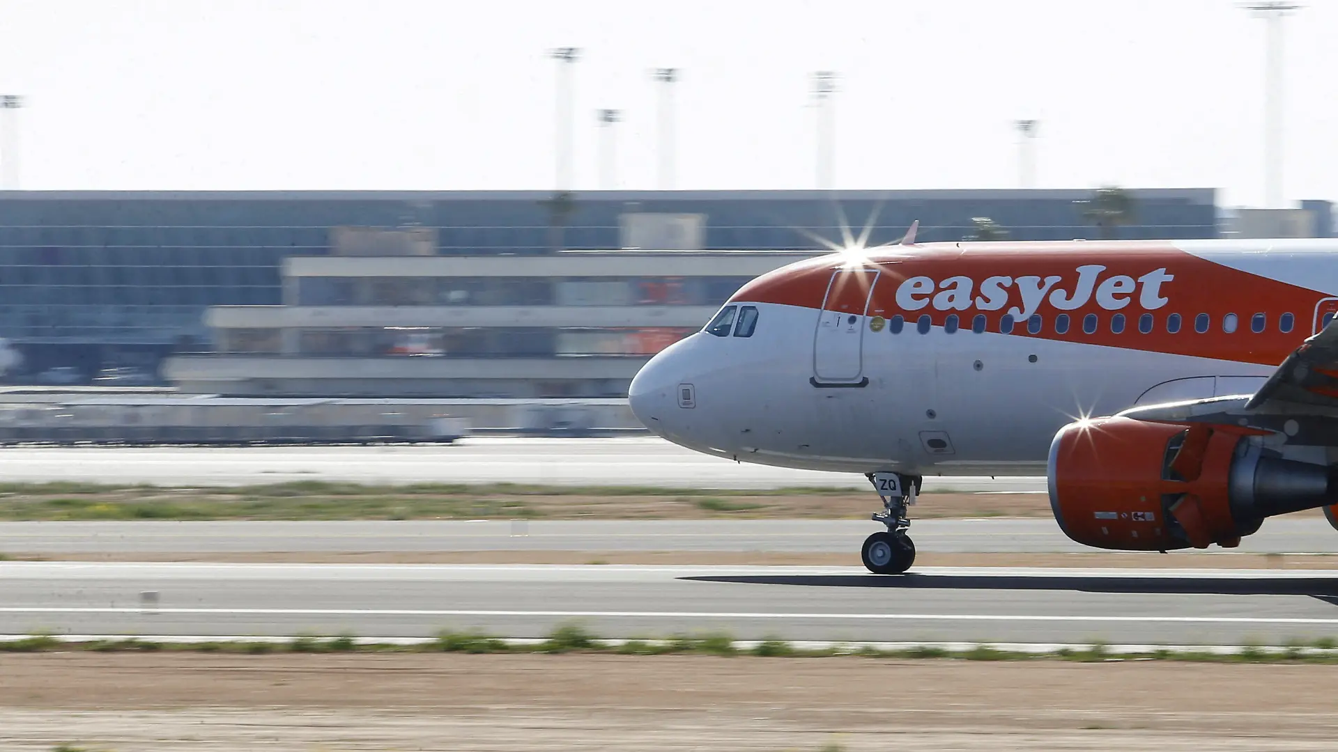 FILE PHOTO: EasyJet airliner lands at Son Sant Joan airport in Palma de Mallorca