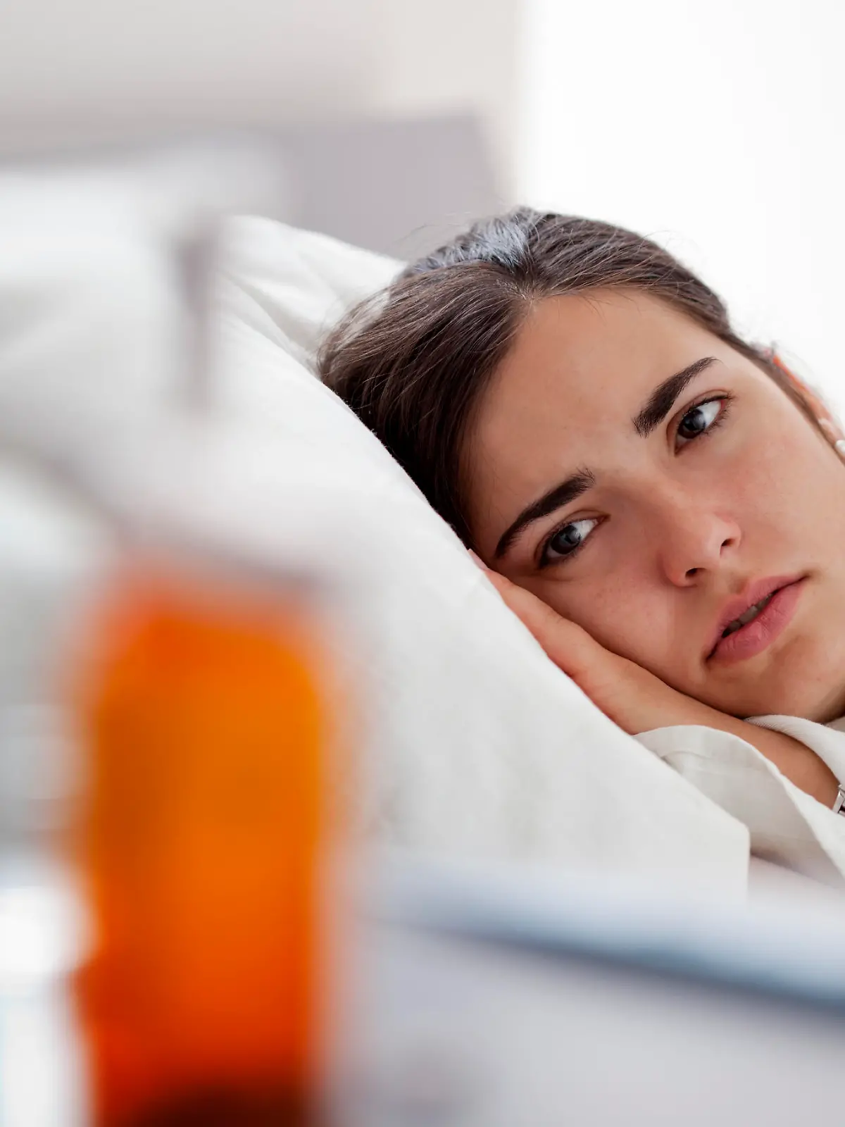 Young woman who feeling sick at home.