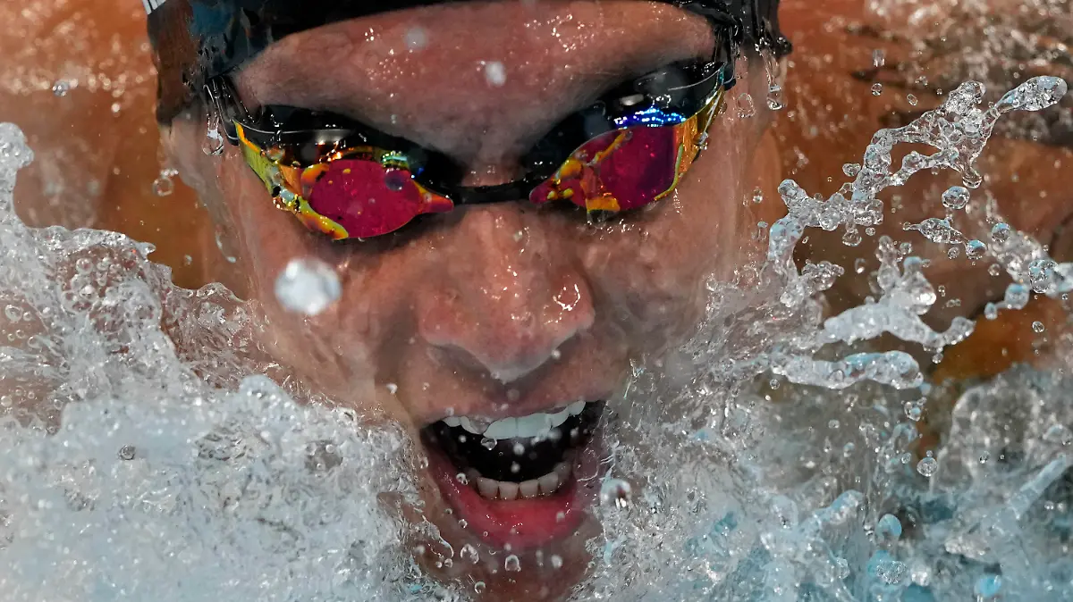 31.07.2021, Japan, Tokio: Schwimmen: Olympia, 100 m Schmetterling, Männer, Finale im Tokyo Aquatics Centre. Caeleb Dressel aus USA in Aktion . Foto: Gregory Bull/AP/dpa +++ dpa-Bildfunk +++