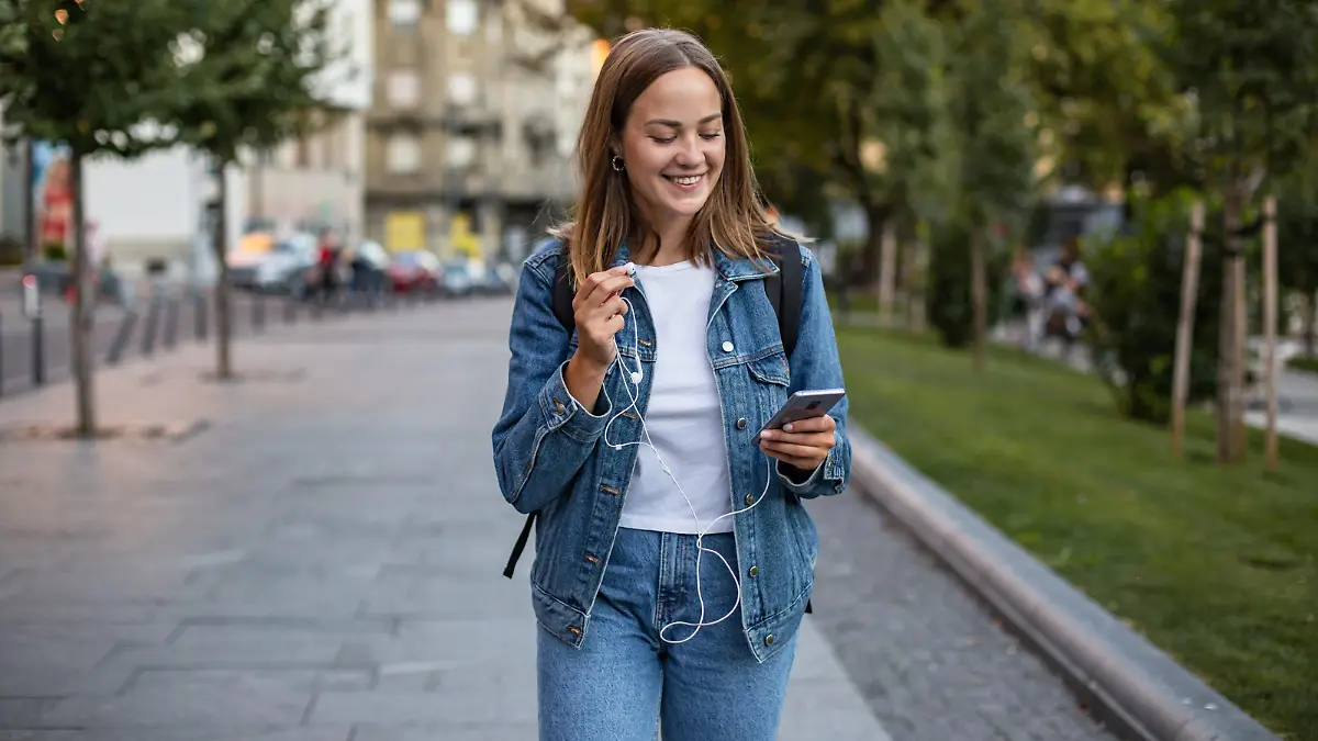 Photo of young woman enjoying in the city