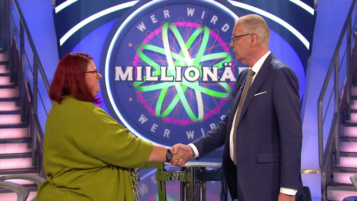 „Wer wird Millionär?”-Moderator Günther Jauch und Kandidatin Claudia Koch