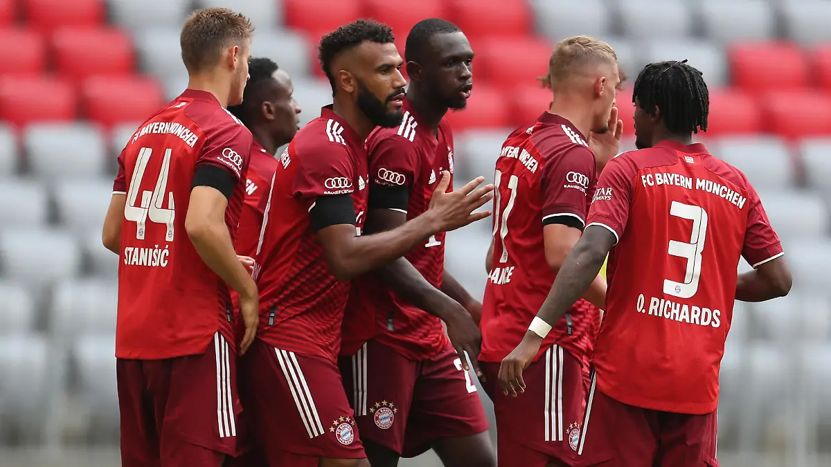 MUNICH, GERMANY - JULY 24: Tanguy Nianzou (C) of FC Bayern Muenchen and teammates celebrate the 2-2 goal during the Audi Football Summit match between FC Bayern Muenchen and Ajax Amsterdam at Allianz Arena on July 24, 2021 in Munich, Germany. (Photo by Alexandra Beier/Getty Images)