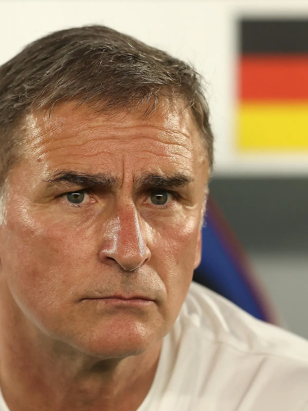 YOKOHAMA, JAPAN - JULY 25: Stefan Kuntz, Head Coach of Team Germany looks on prior to the Men's First Round Group D match between Saudi Arabia and Germany on day two of the Tokyo 2020 Olympic Games at International Stadium Yokohama on July 25, 2021 in Yokohama, Kanagawa, Japan. (Photo by Francois Nel/Getty Images)