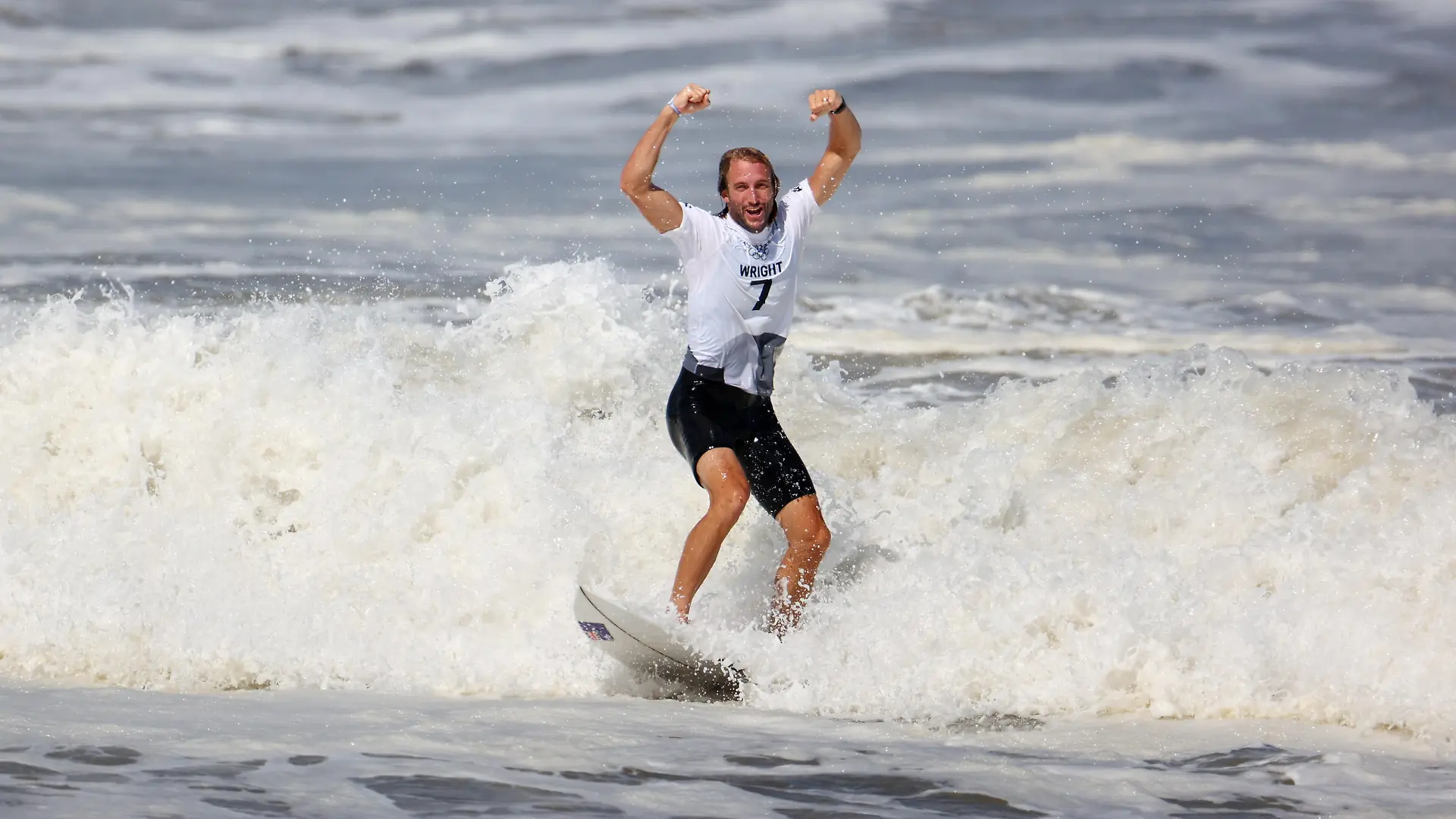 Tokyo 2020 Olympics - Surfing - Men's Shortboard - Bronze Medal Match - Tsurigasaki Surfing Beach, Chiba, Japan - July 27, 2021. Owen Wright of Australia celebrates after winning bronze REUTERS/Lisi Niesner REFILE - CORRECTING DATE