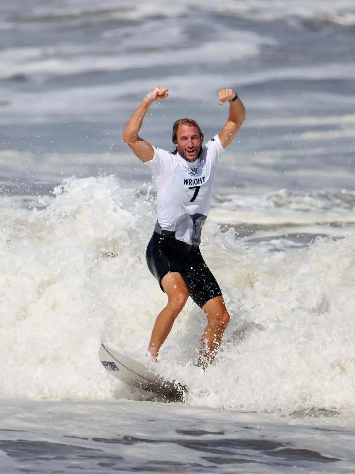 Tokyo 2020 Olympics - Surfing - Men's Shortboard - Bronze Medal Match - Tsurigasaki Surfing Beach, Chiba, Japan - July 27, 2021. Owen Wright of Australia celebrates after winning bronze REUTERS/Lisi Niesner  REFILE - CORRECTING DATE
