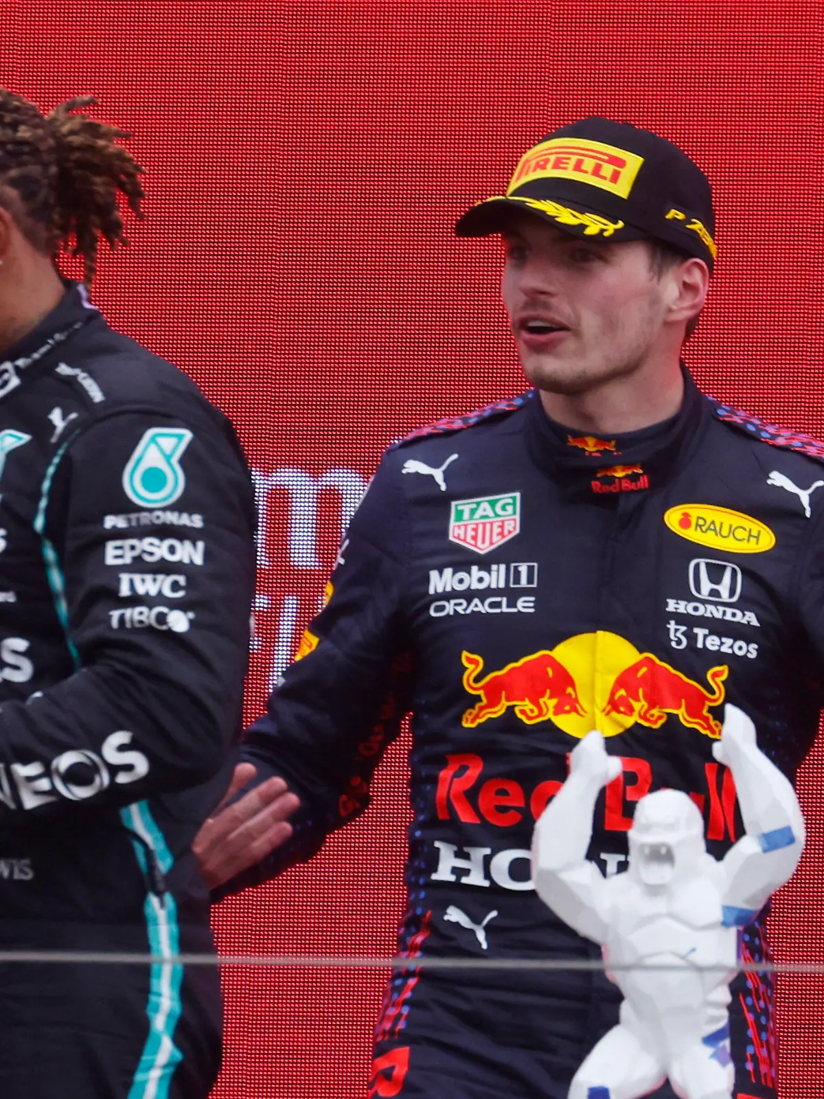 Formula One F1 - French Grand Prix - Circuit Paul Ricard, Le Castellet, France - June 20, 2021 Red Bull's Max Verstappen celebrates on the podium after winning the race alongside second placed Mercedes' Lewis Hamilton REUTERS/Eric Gaillard
