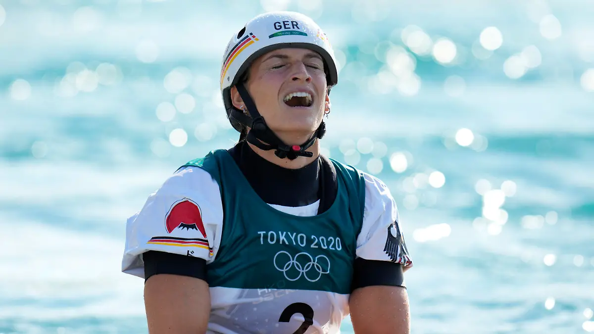 Ricarda Funk of Germany celebrates after crossing the finish line to win gold in the Women's K1 of the Canoe Slalom at the 2020 Summer Olympics, Tuesday, July 27, 2021, in Tokyo, Japan. (AP Photo/Kirsty Wigglesworth)