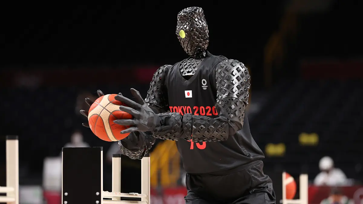 SAITAMA, JAPAN - JULY 25: A robot plays basketball during halftime of the Men's Preliminary Round Group B game between the United States and France on day two of the Tokyo 2020 Olympic Games at Saitama Super Arena on July 25, 2021 in Saitama, Japan. (Photo by Gregory Shamus/Getty Images)