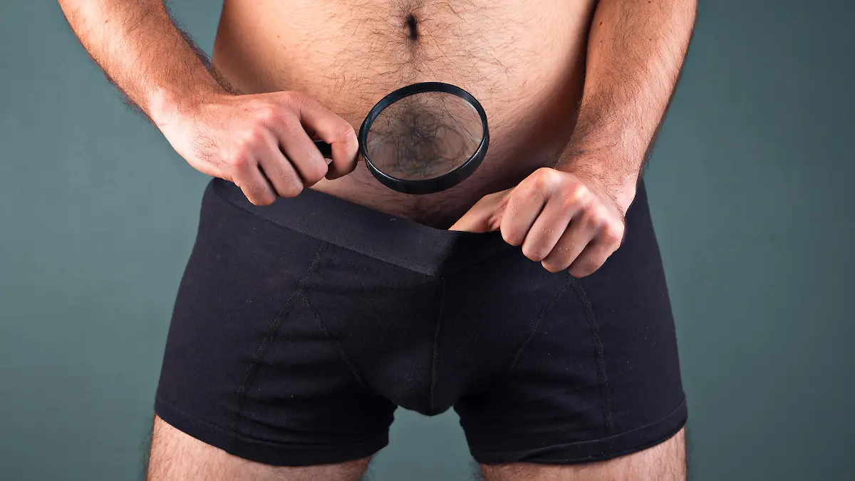 Men's Sexual Health with green wall.