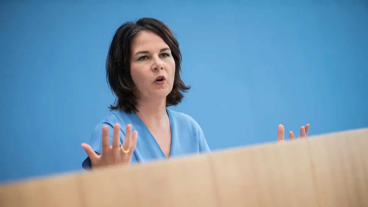 Annalena Baerbock, co-leader of Germany's Green (Die Gruenen) party and top candidate for the upcoming national election, addresses a news conference on the follow-up of the flood disaster at the house of the Federal Press Conference (Bundespressekonferenz) in Berlin, July 26, 2021. Stefanie Loos/Pool via REUTERS