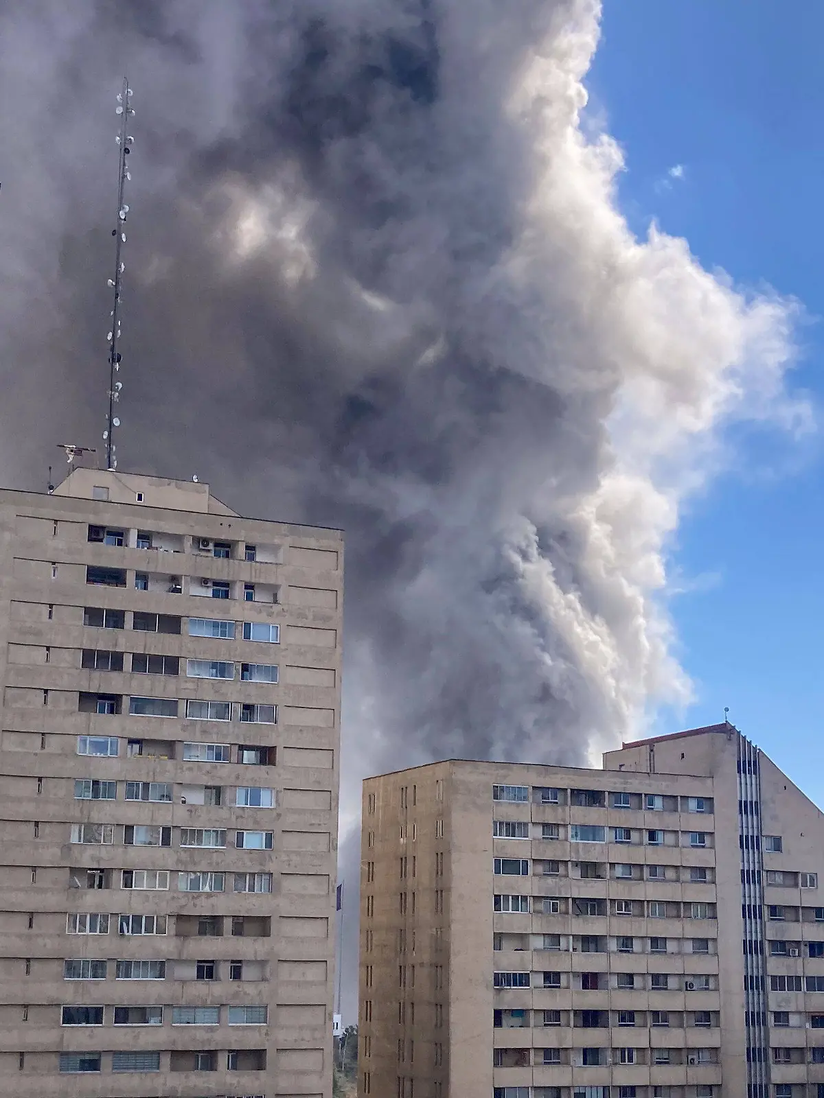 Plumes of smoke rise following reported explosions in Tehran on March 1, 2026, after Irans supreme leader, Ayatollah Ali Khamenei, was killed a day earlier in a large U.S. and Israeli attack, prompting a new wave of retaliatory missile strikes from Iran.//MIDDLEEASTIMAGES_MEI-IRN-Fr-EXITM-20260301-06/Credit:Fariba/MEI/SIPA/2603020847