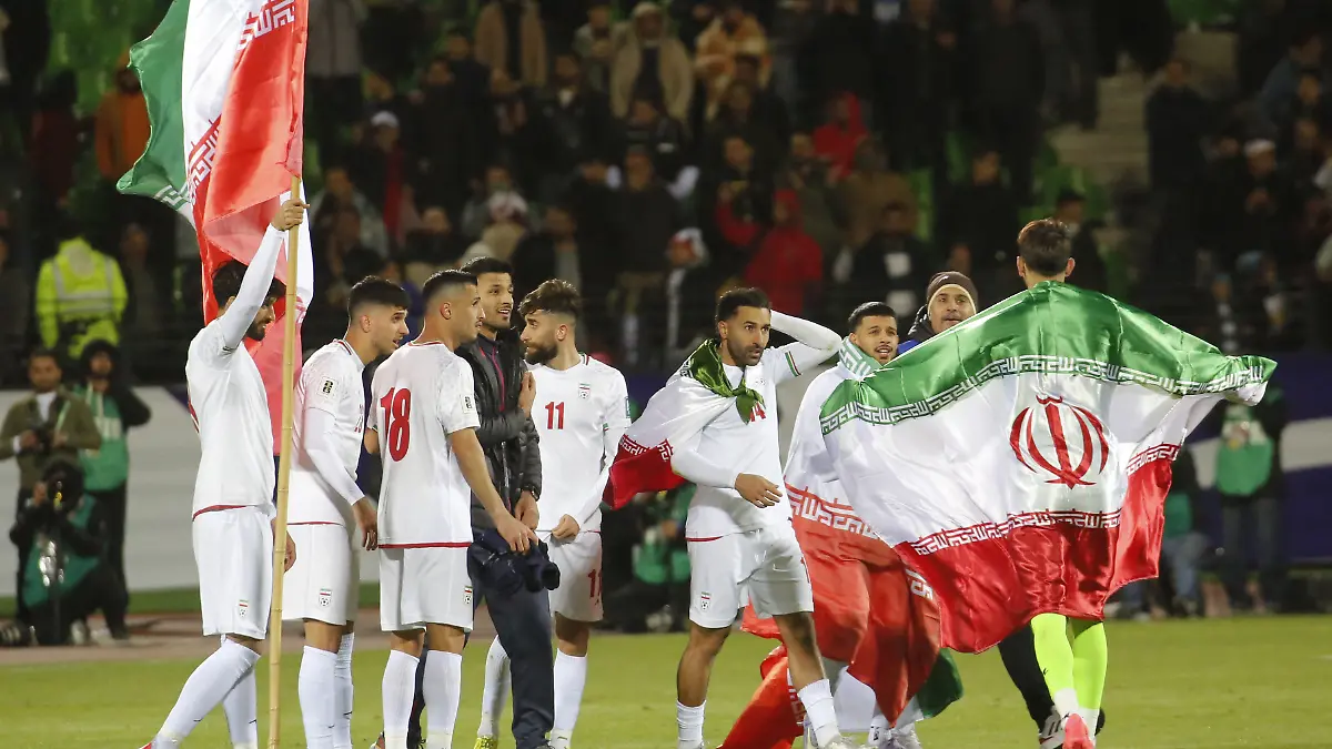 TEHRAN, IRAN - MARCH 25: Players of Iran celebrate after the 2026 FIFA World Cup Asian Qualifiers Group A game between Iran and Uzbekistan at Azadi Stadium on March 25, 2025 in Tehran, Iran. Iran's national football team celebrated after securing qualification for the 2026 FIFA World Cup with a 2-2 draw against Uzbekistan. Fatemeh Bahrami / Anadolu/ABACAPRESS.COM