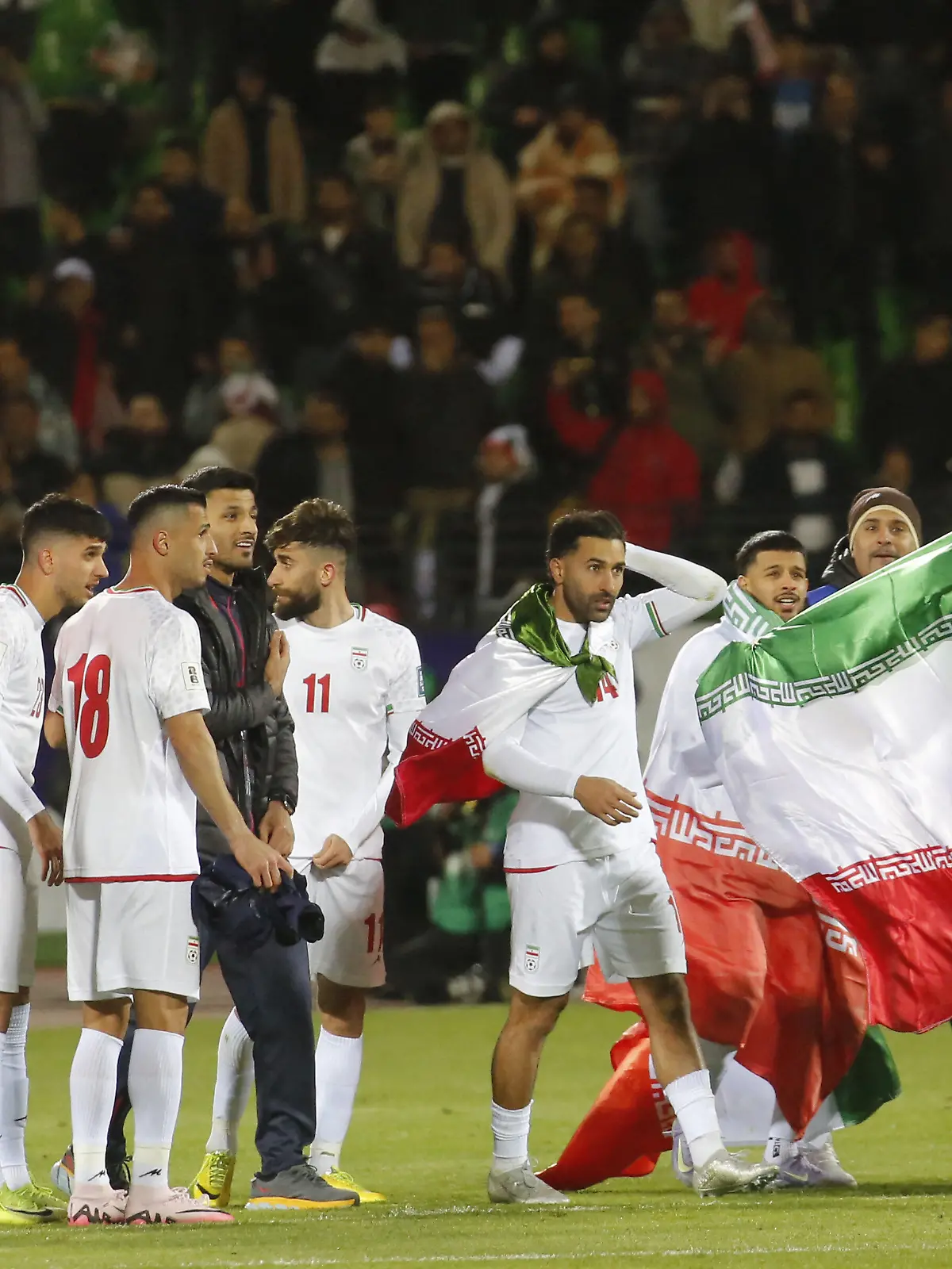 TEHRAN, IRAN - MARCH 25: Players of Iran celebrate after the 2026 FIFA World Cup Asian Qualifiers Group A game between Iran and Uzbekistan at Azadi Stadium on March 25, 2025 in Tehran, Iran. Iran's national football team celebrated after securing qualification for the 2026 FIFA World Cup with a 2-2 draw against Uzbekistan. Fatemeh Bahrami / Anadolu/ABACAPRESS.COM
