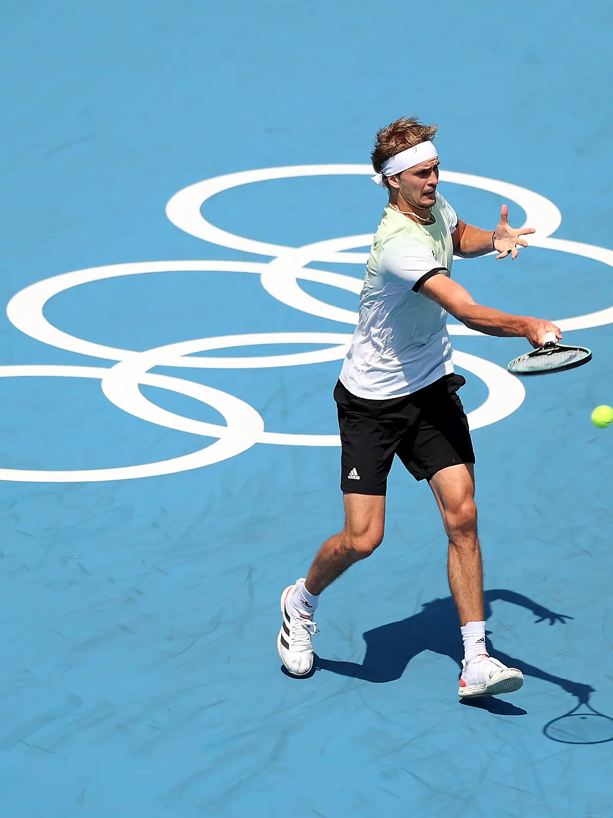 TOKYO, JAPAN - JULY 25: Alexander Zverev of Team Germany plays a forehand during his Men's Singles First Round match against Yen-Hsun Lu of Team Chinese Taipei on day two of the Tokyo 2020 Olympic Games at Ariake Tennis Park on July 25, 2021 in Tokyo, Japan. (Photo by Patrick Smith/Getty Images)
