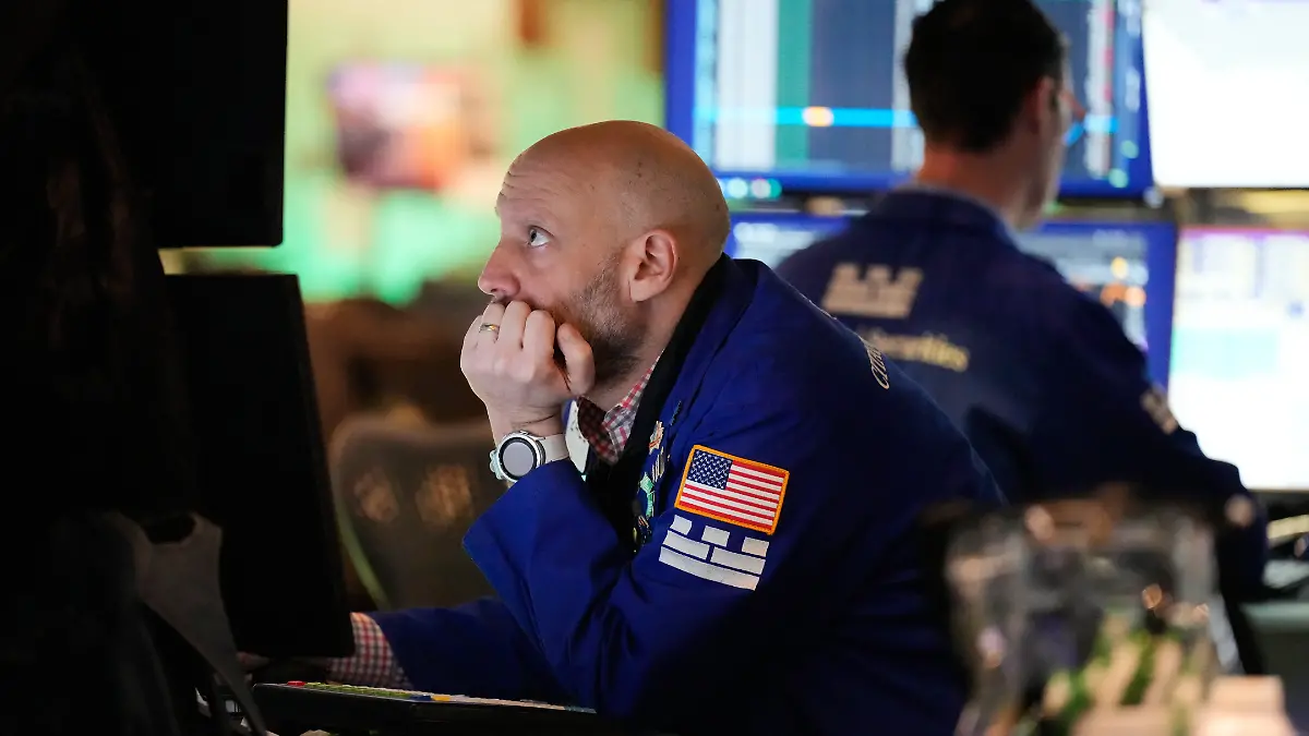 Meric Greenbaum works on the floor at the New York Stock Exchange in New York, Tuesday, March 3, 2026. (AP Photo/Seth Wenig)