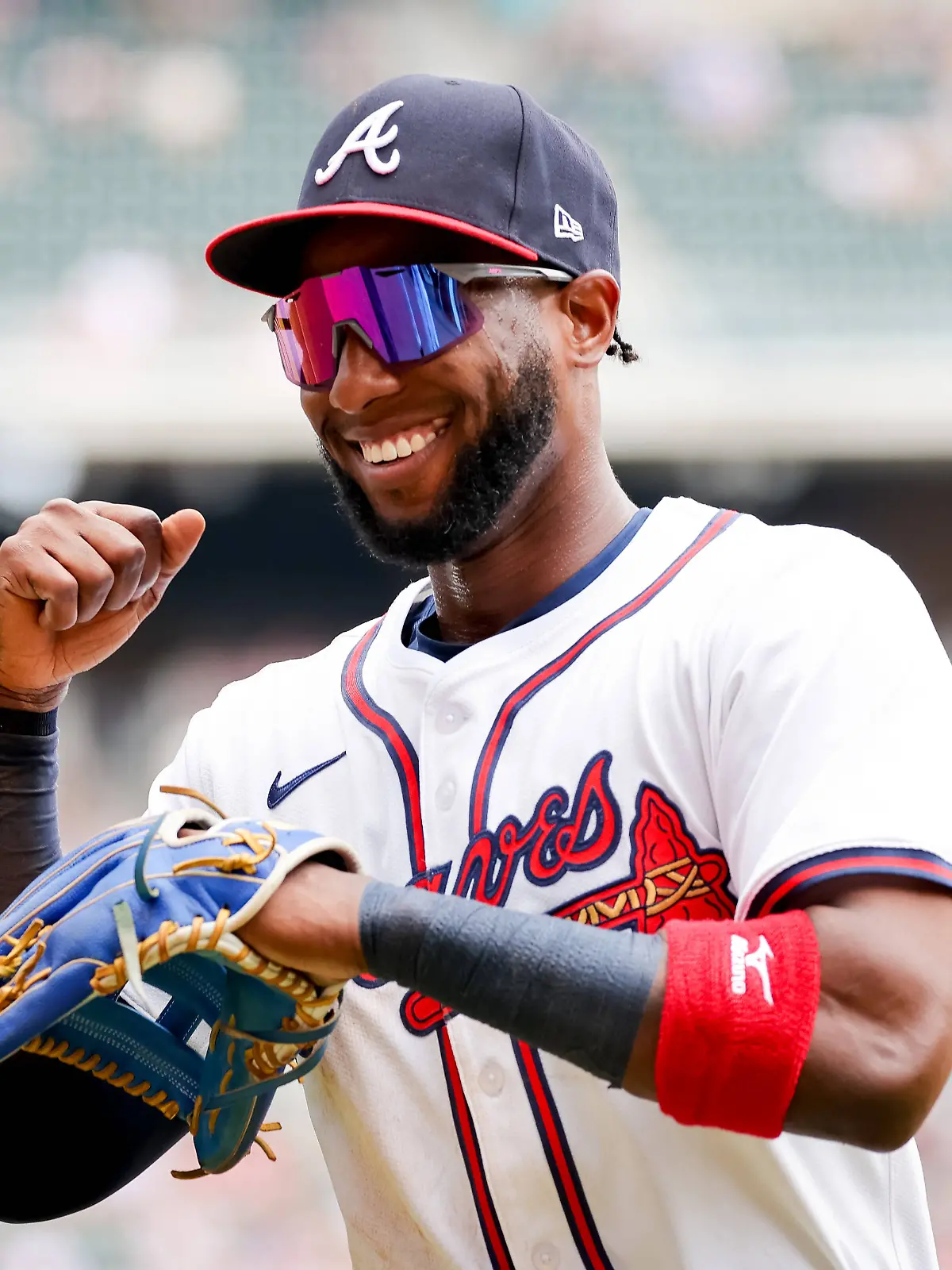 Jurickson Profar of the Atlanta Braves celebrates while coming back to the dugout in the fourth inning after making a catch to rob a home run from the Miami Marlins at Truist Park in Marietta, Georgia on Saturday, August 9, 2025. PUBLICATIONxINxGERxSUIxAUTxHUNxONLY ATL20250809142 CaseyxSykes