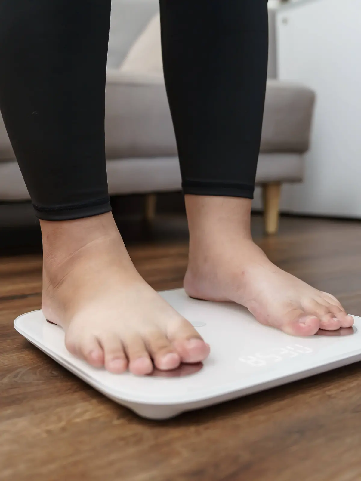 Fat diet and scale feet standing on electronic scales for weight control. Measurement instrument in kilogram for a diet control. Fat diet and scale feet standing on electronic scales for weight control. Measurement instrument in kilogram for a diet control LicenseRF 20592821 Copyright: xZoonar.com/SirijitxJongcharoenkulchaix 20592821