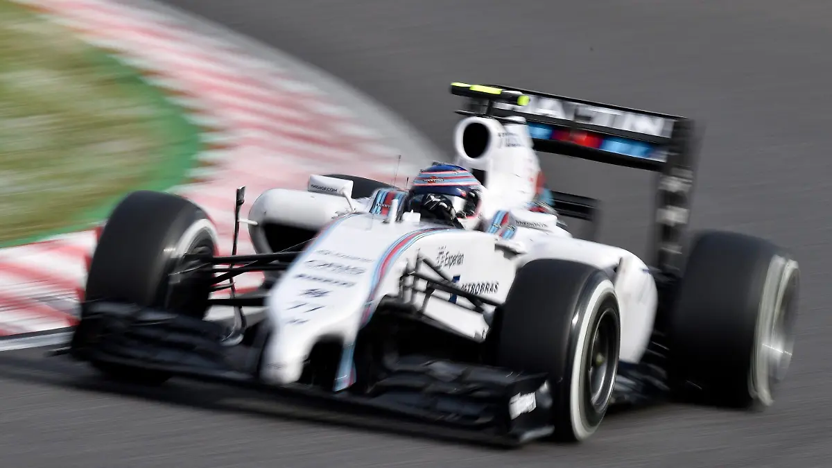 epa04430802 Finnish Formula One driver Valtteri Bottas of Williams steers his car during the qualifying session of the Japanese Formula One Grand Prix at the Suzuka Circuit in Suzuka, Mie Prefecture, central Japan, 04 October 2014. The Japanese Formula One Grand Prix will be held on 05 October 2014. EPA/FRANCK ROBICHON +++(c) dpa - Bildfunk+++