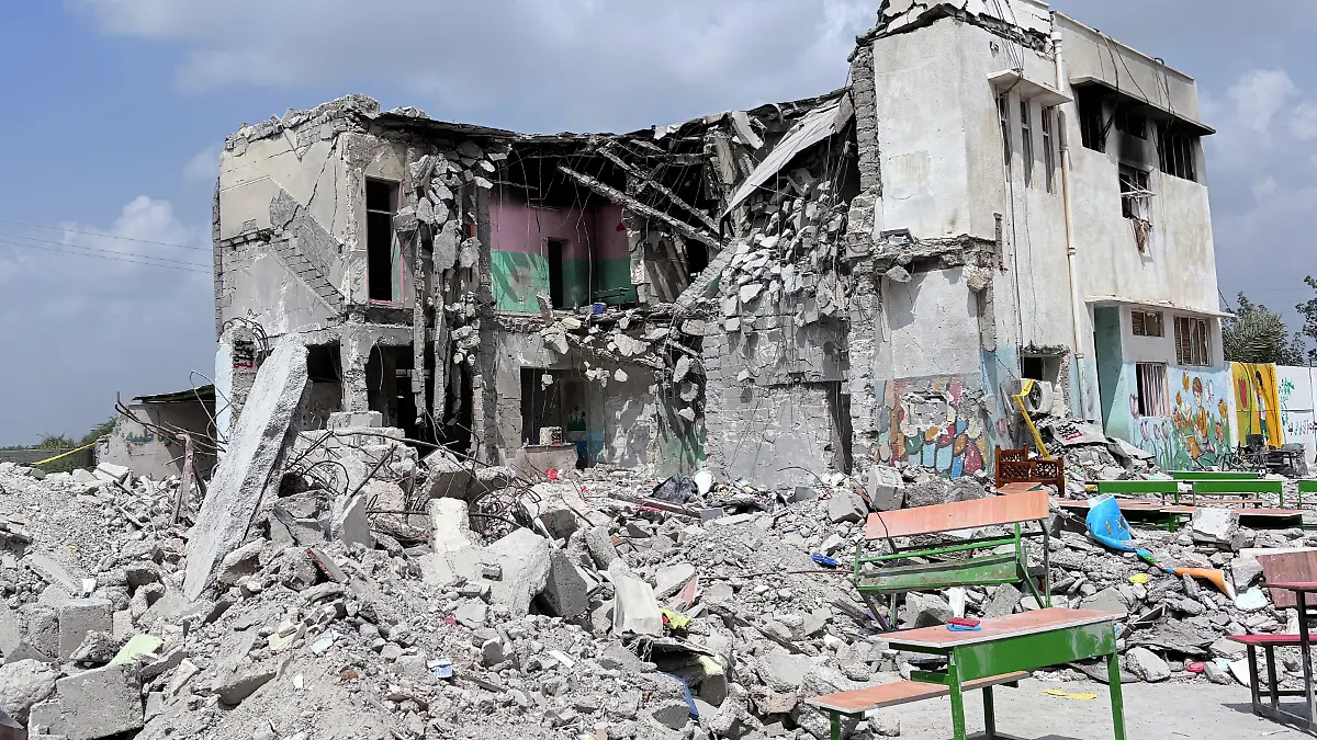HORMOZGAN, IRAN - MARCH 05: A view of the debris of a school, where many students and teachers lost their lives on the first day of the wave of attacks launched by the United States and Israel against Iran, in Hormozgan, Iran on March 05, 2026. As a result of the attack, which was carried out twice, 40 minutes apart, on a girlsÄô primary school in the city of Minab, the school building suffered severe damage. Stringer / Anadolu