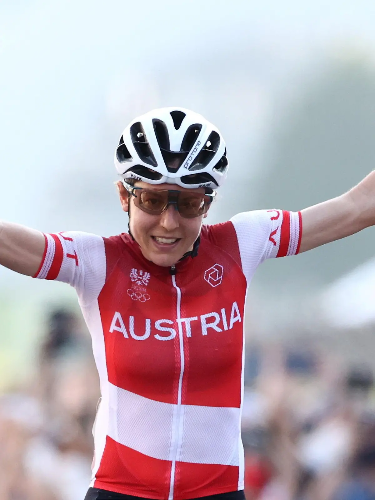 Tokyo 2020 Olympics - Cycling - Road - Women's Road Race - Final - Tokyo to Fuji International Speedway - Tokyo, Japan - July 25, 2021.  Anna Kiesenhofer of Austria celebrates winning gold. REUTERS/Christian Hartmann