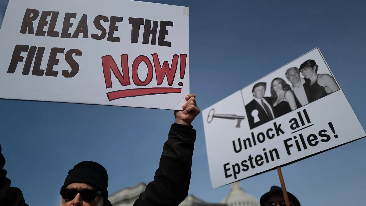 Demonstrators hold signs in support of releasing the Epstein files near a press conference at the U.S. Capitol in Washington, D.C. on November 18, 2025. Members of Congress and alleged survivors of Epstein discussed the Epstein Files Transparency Act, which calls for the release of all unclassified documents in the Jeffrey Epstein case. The House of Representatives is scheduled to vote today on the release of the files. (Photo by Bryan Dozier/NurPhoto)