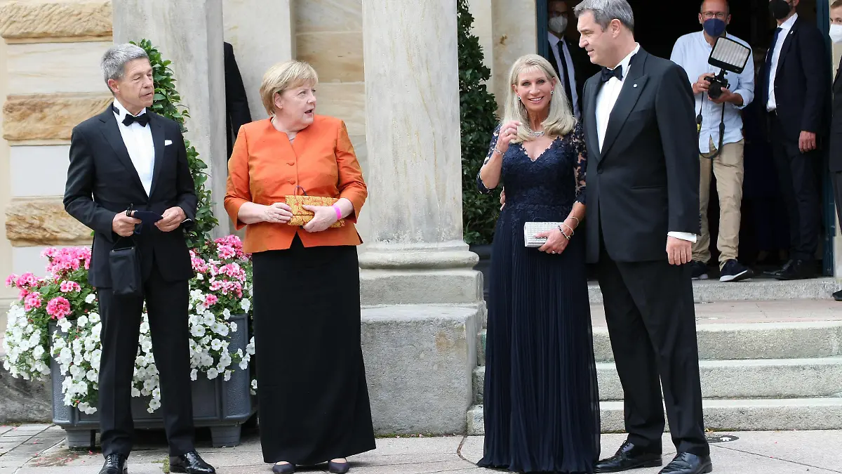 German Chancellor Angela Merkel and Husband Joachim Sauer meet Markus Söder and his wife Leopold Werner at the Bayreuther Festspiele 2021 during the Covid 19 Coronavirus Pandemie in Bayreuth , Bayern , Deutschland . July 25 , 2021.