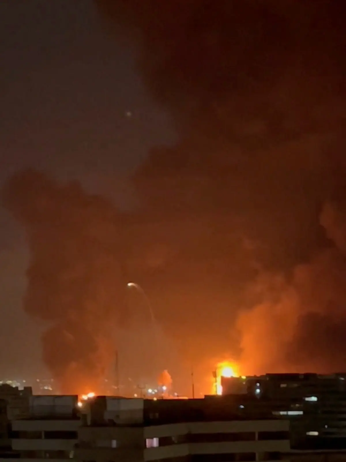 Heavy fire and smoke in the direction of Mehrabad Airport, amid the U.S.-Israeli conflict with Iran, in Tehran, Iran this screen grab obtained from a social media video released March 7, 2026. Social Media/via REUTERS  THIS IMAGE HAS BEEN SUPPLIED BY A THIRD PARTY. NO RESALES. NO ARCHIVES. NEWS USE ONLY.  VERIFICATION: Buildings, building shape, road layout, parking area, and signages match satellite and file images Date not verified but no older version of the footage was found posted online before March 7 NASA FIRMS detected thermal activity in Tehran’s Mehrabad Airport at 1:50 a.m. on March 7 local time (10:20 p.m. GMT, March 6) Iran’s semi-official news agency Tasnim reported that heavy air attacks hit Tehran’s Mehrabad Airport on March 7