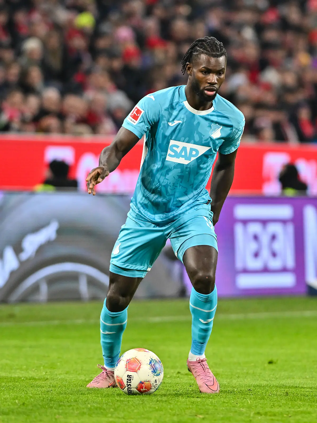 MUNICH, GERMANY - 08. FEBRUARY: am Ball Ihlas BEBOU (Hoffenheim 9) / Einzelfoto / Freisteller während dem Bundesligamatch zwischen dem FC FC Bayern Munich und der TSG 1899 Hoffenheim am 21. Spieltag in der Allianz Arena / DFL REGULATIONS PROHIBIT ANY USE OF PHOTOGRAPHS AS IMAGE SEQUENCES AND/OR QUASI-VIDEO