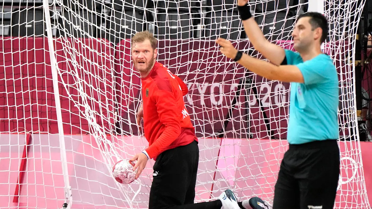 Germany's goalkeeper Johannes Bitter reacts during the men's preliminary round group A handball match between Germany and Spain at the 2020 Summer Olympics, Saturday, July 24, 2021, in Tokyo, Japan. (AP Photo/Sergei Grits)