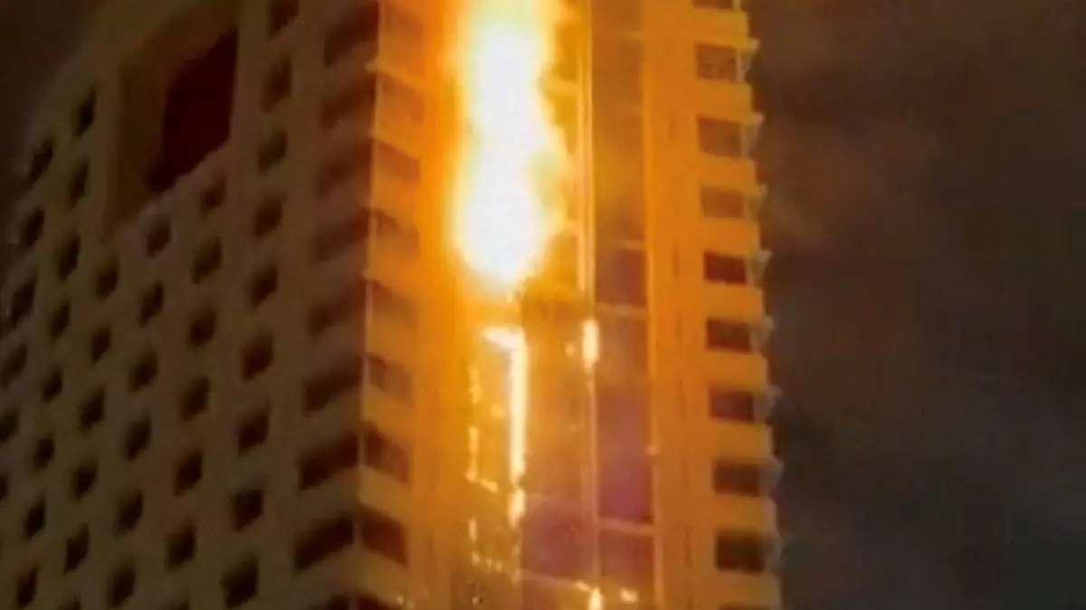 Smoke rises from a building on fire, in the aftermath of what the Kuwaiti Army says is a drone attack, amid the U.S.-Israeli conflict with Iran, in Kuwait City, Kuwait March 8, 2026 in this screengrab taken from a social media video. SOCIAL MEDIA/via REUTERS THIS IMAGE HAS BEEN SUPPLIED BY A THIRD PARTY. NO RESALES. NO ARCHIVES. VERIFICATION: Reuters was able to confirm the location from buildings, road layout, road signs and the bridge which matched file image and satellite images. Coordinates of the building being hit were at 29.362763799479662, 47.98382949072929. Reuters was able to confirm the date of the video from government statements and local news reports. Kuwait military wrote on X that some civilian facilities were damaged, and the General Organization for Social Insurance confirmed that the main building of the organization was targeted on March 8. TPX IMAGES OF THE DAY