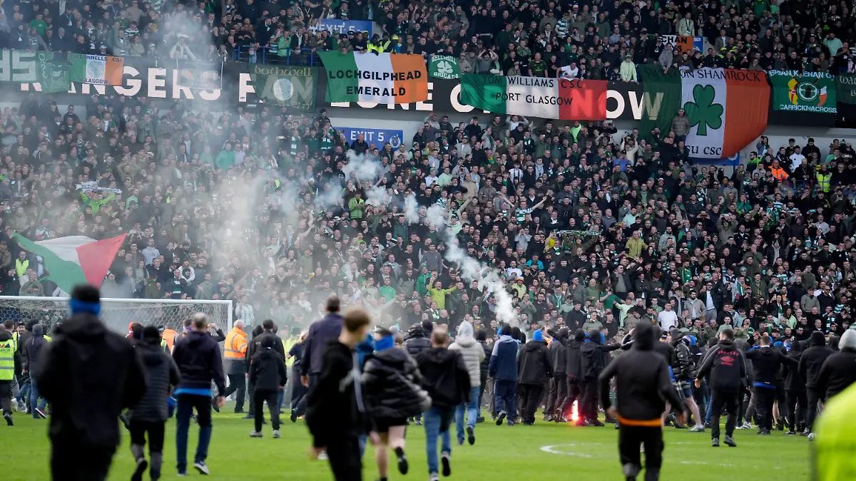 Rangers v Celtic - Scottish Gas Men's Scottish Cup - Quarter Final - Ibrox Stadium. Pitch invasion after Celtic win on penalties after the Scottish Gas Men's Scottish Cup quarter-final match at Ibrox Stadium, Glasgow. Picture date: Sunday March 8, 2026. Photo credit should read: Andrew Milligan/PA Wire. RESTRICTIONS: EDITORIAL USE ONLY No use with unauthorised audio, video, data, fixture lists, club/league logos or "live" services. Online in-match use limited to 120 images, no video emulation. No use in betting, games or single club/league/player publications. URN:83787965