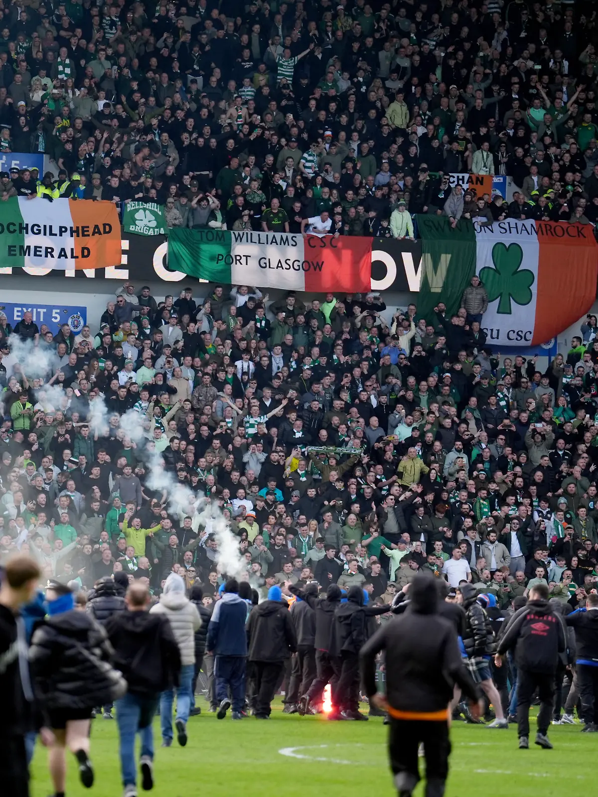 Rangers v Celtic - Scottish Gas Men's Scottish Cup - Quarter Final - Ibrox Stadium. Pitch invasion after Celtic win on penalties after the Scottish Gas Men's Scottish Cup quarter-final match at Ibrox Stadium, Glasgow. Picture date: Sunday March 8, 2026. Photo credit should read: Andrew Milligan/PA Wire. RESTRICTIONS: EDITORIAL USE ONLY No use with unauthorised audio, video, data, fixture lists, club/league logos or "live" services. Online in-match use limited to 120 images, no video emulation. No use in betting, games or single club/league/player publications. URN:83787965